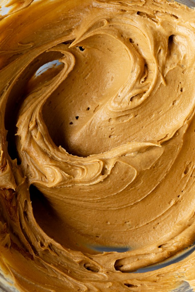 Close up of the coffee buttercream in a bowl.