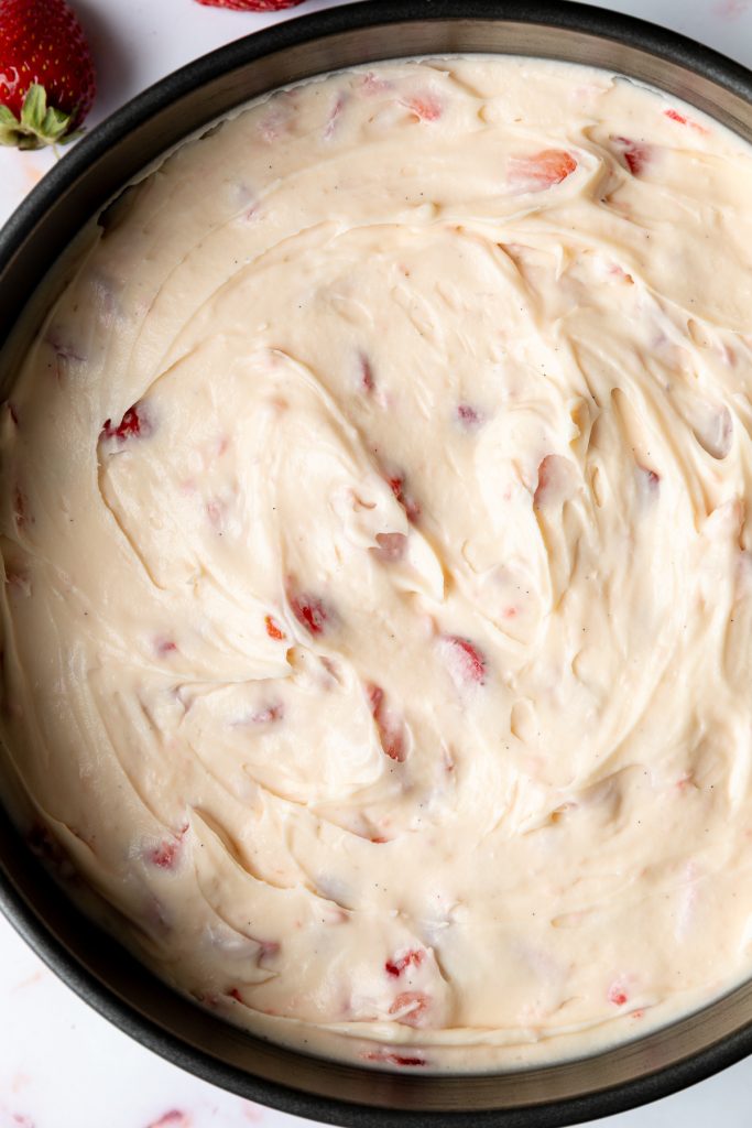 The cheesecake filling spooned on top of the base and smoothed out, ready to go in the fridge.