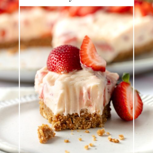 A slice of no bake strawberry cheesecake on a plate with text overlay to create a pin for Pinterest.