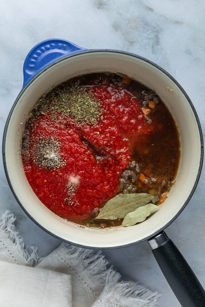 The rest of the bolognese sauce ingredients added to the pan.