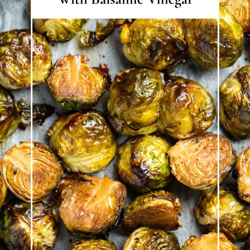 Oven roasted Brussels sprouts on a tray with a text overlay to create a pin for Pinterest.