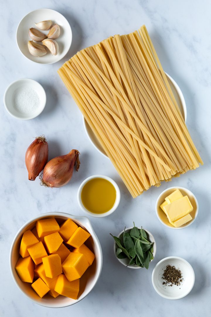 Ingredients needed to make the recipe weighed out and placed in individual bowls and plates.