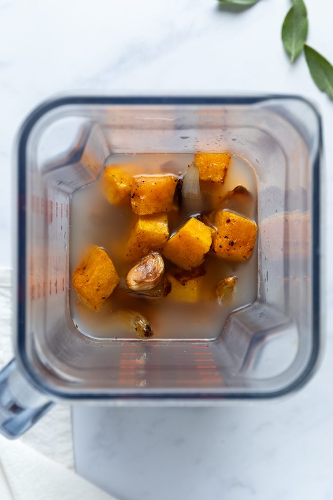 The roasted vegetables in a blender with pasta water.