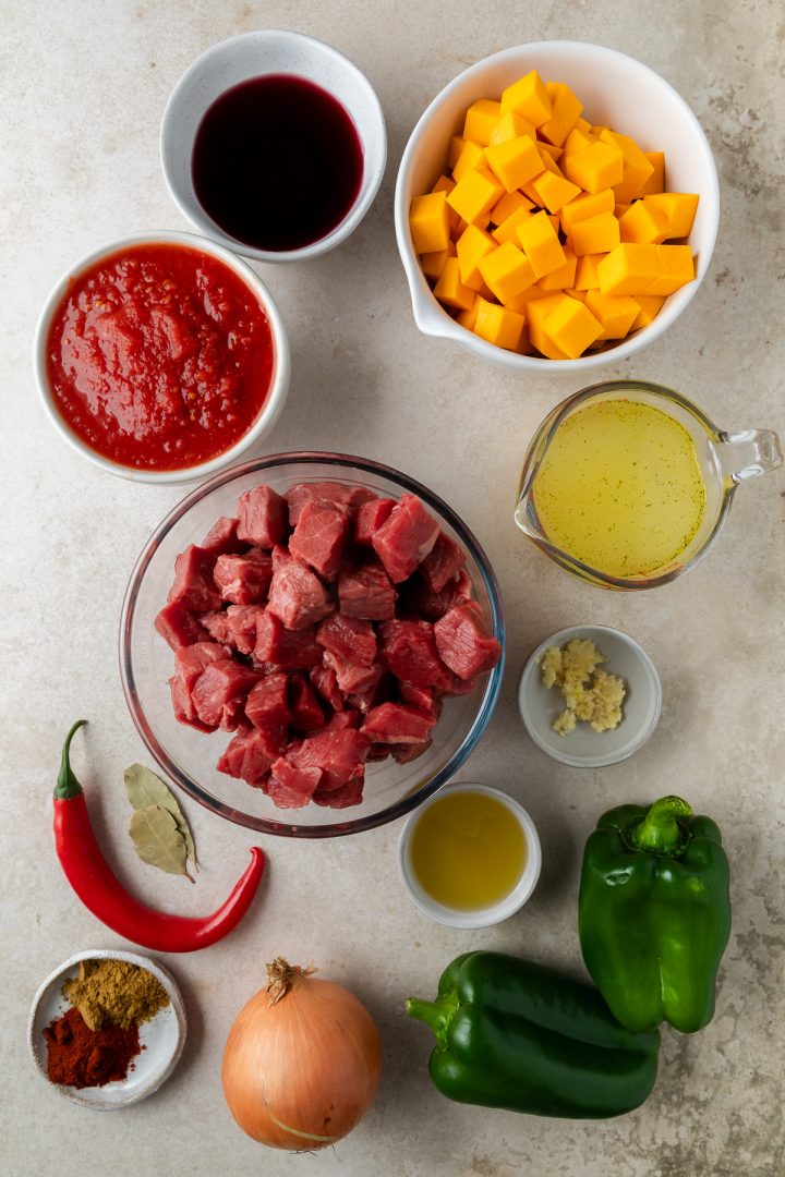 Ingredients needed to make the beef stew with butternut weighed out and placed in individual bowls.