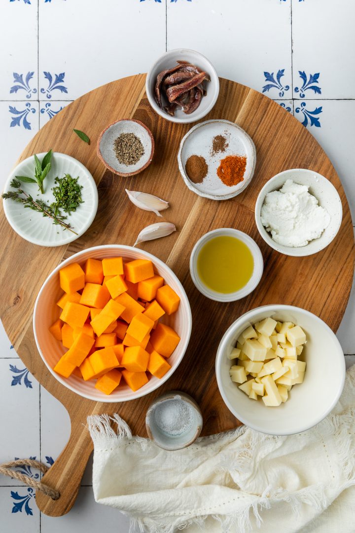 Ingredients needed to make the butternut pizza weighed out and placed in individual bowls.
