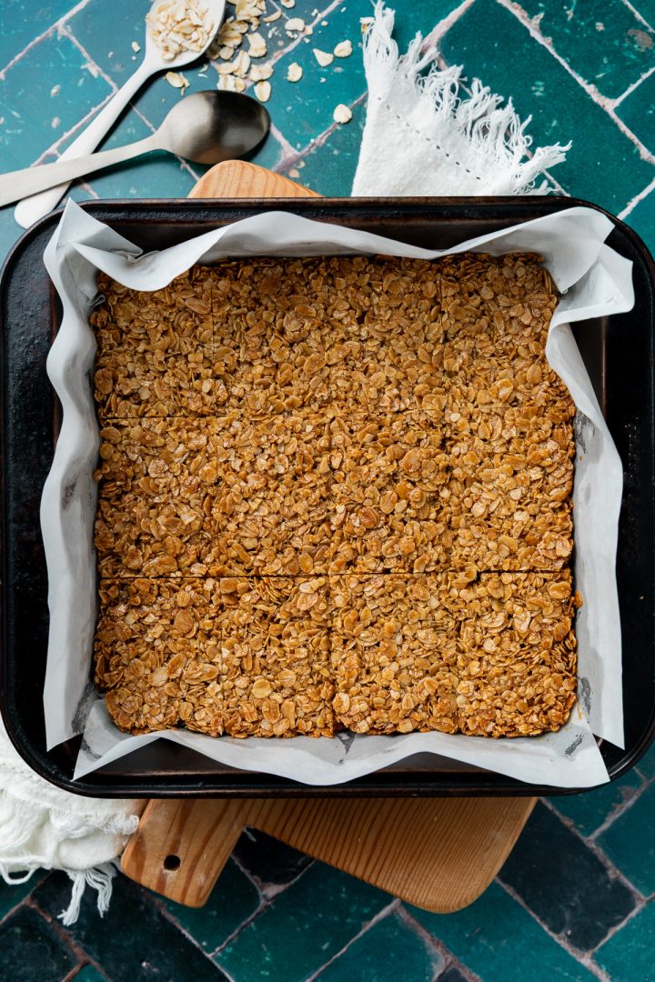 The baked oat bars in the tin.