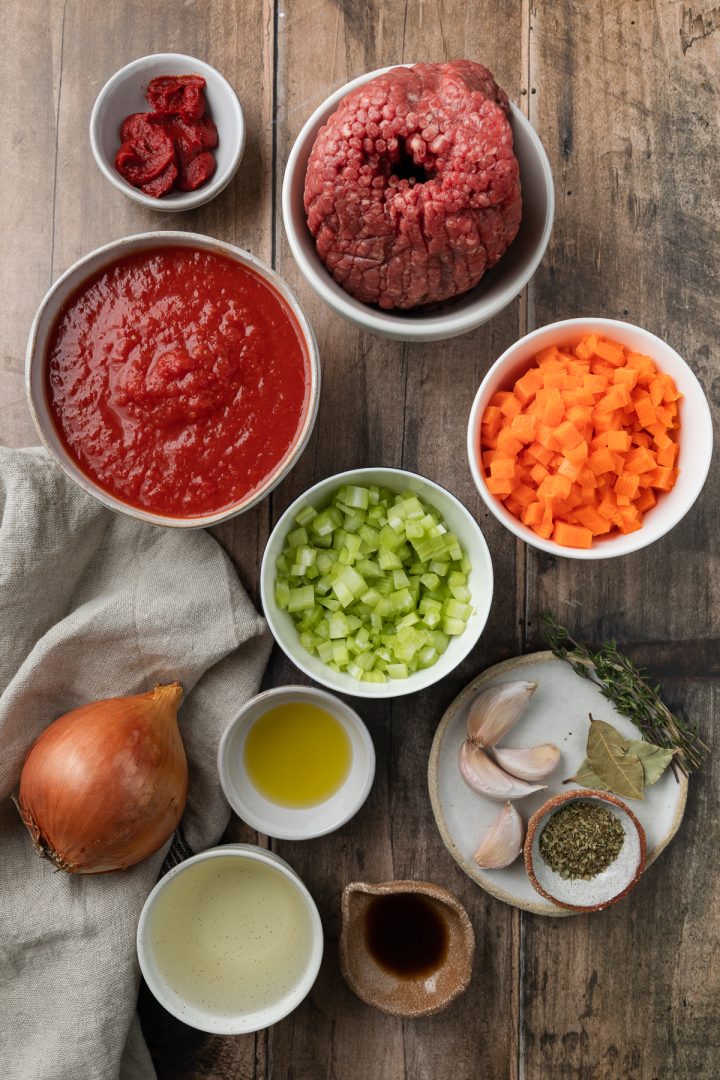 The ingredients needed to make the bolognese recipe weighed out and placed in individual bowls.
