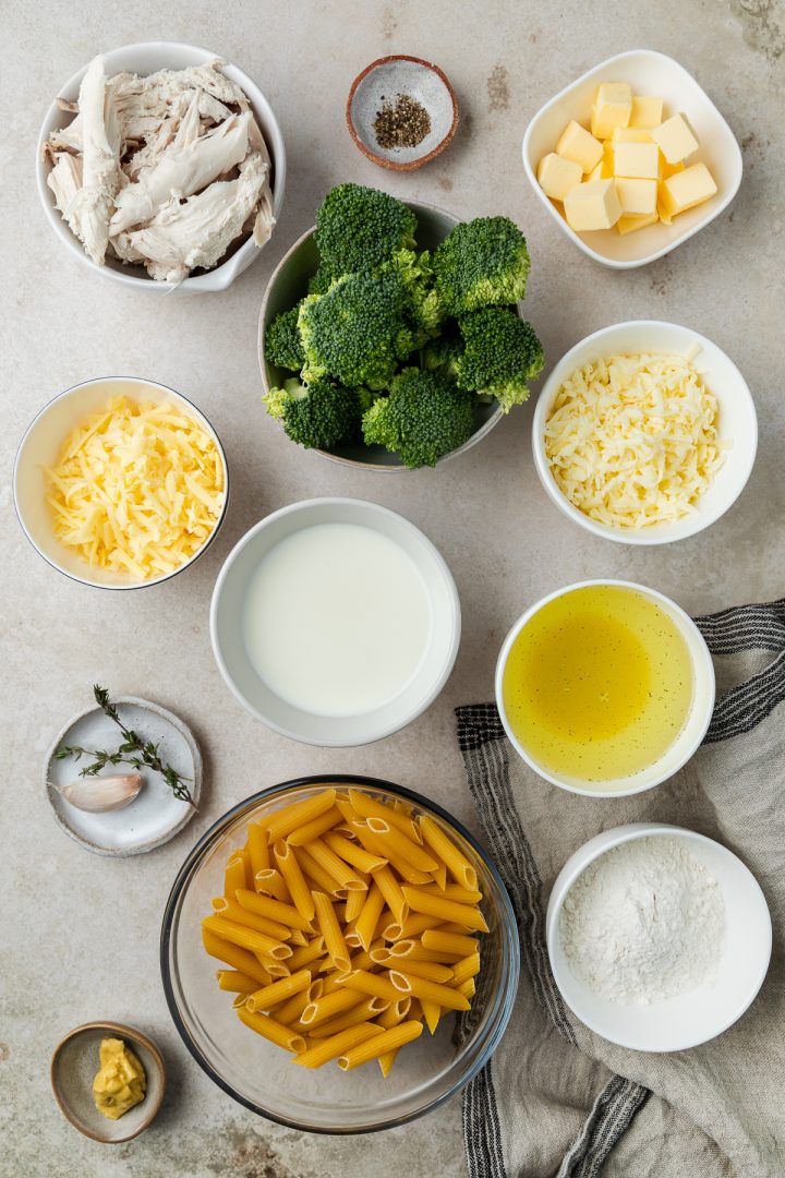 Ingredients needed to make the pasta bake recipe weighed out and placed in individual bowls.