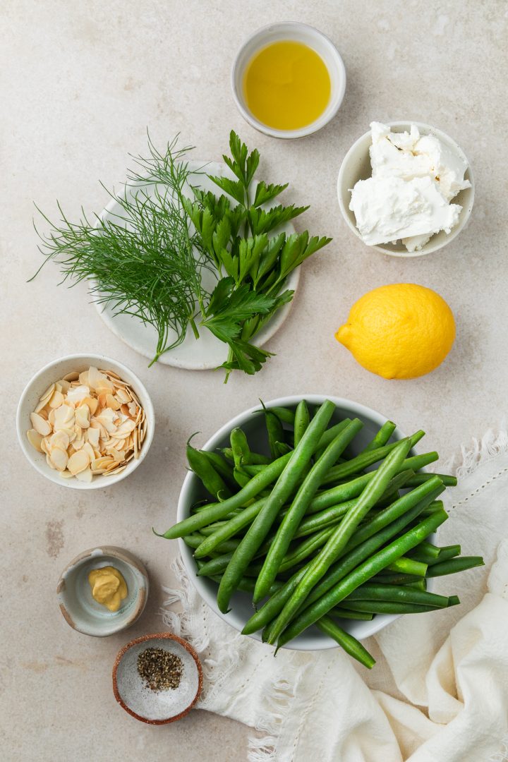 Ingredients needed to make the salad recipe weighed out and placed in individual bowls.