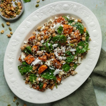 The roasted sweet potato salad on a serving platter ready to serve.