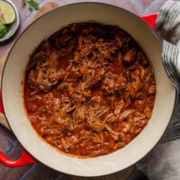 A pan of home cooked slow cooked pulled beef.